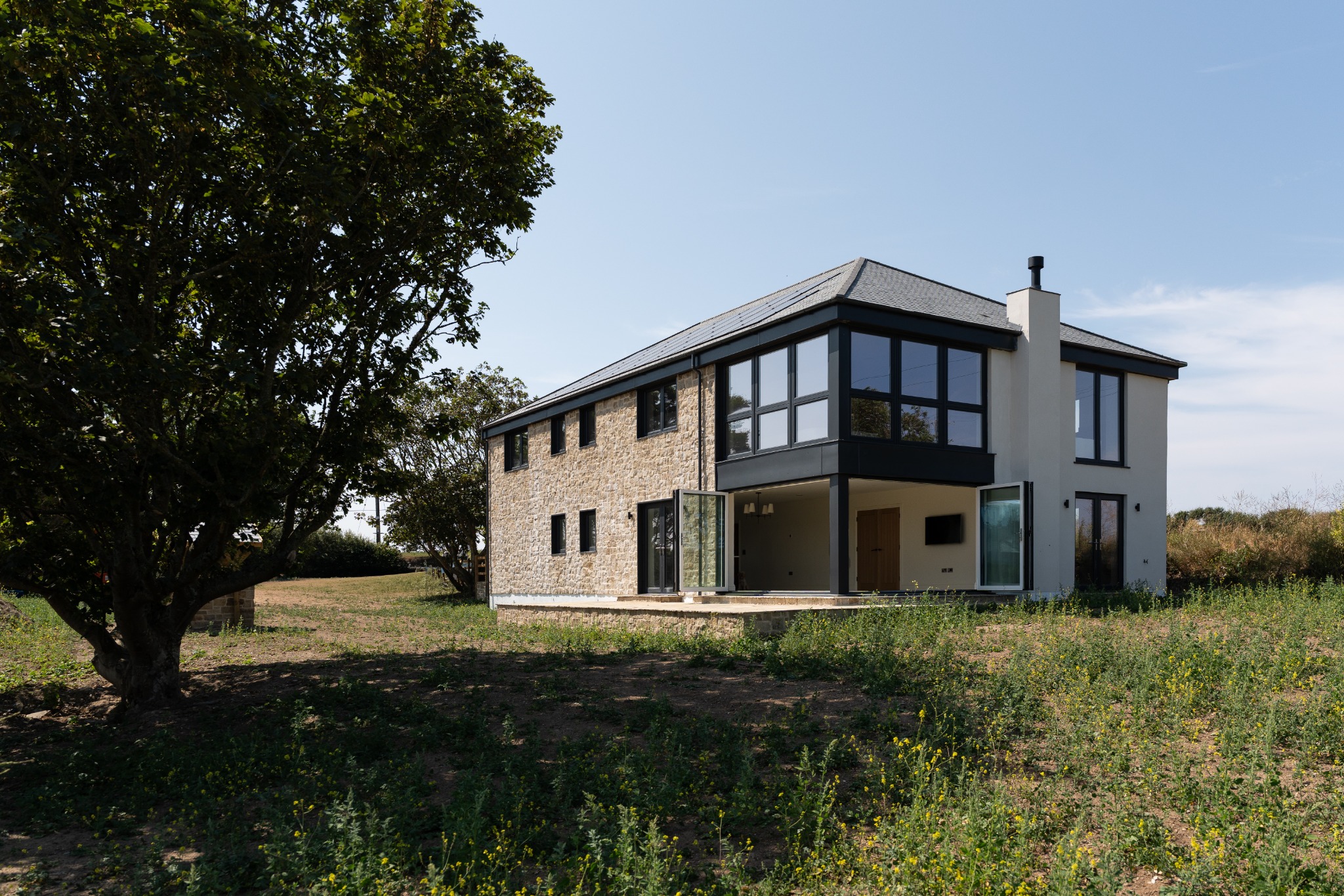 Completed Parc Carn home in its landscape