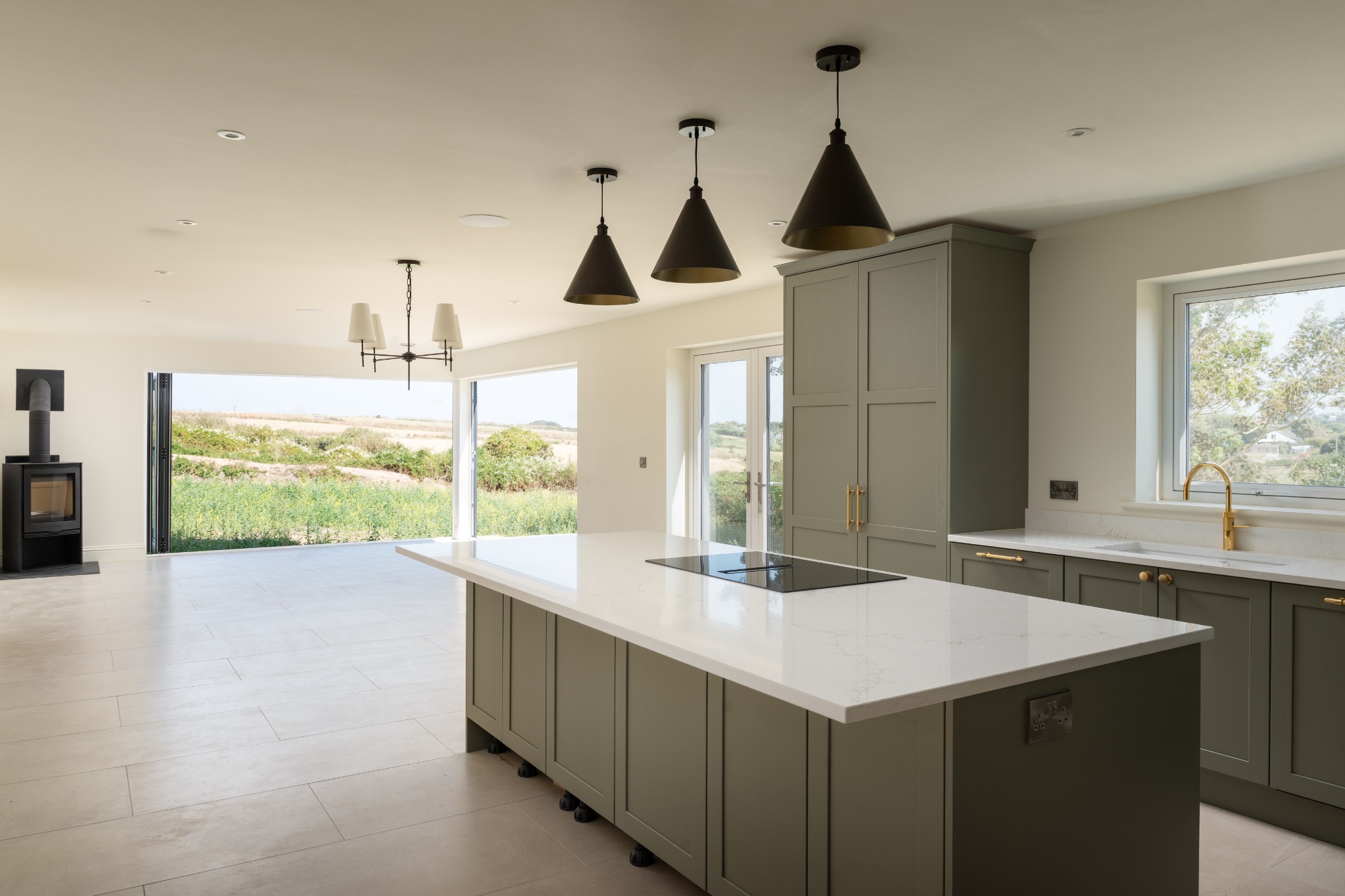 Open-plan kitchen looking towards the landscape
