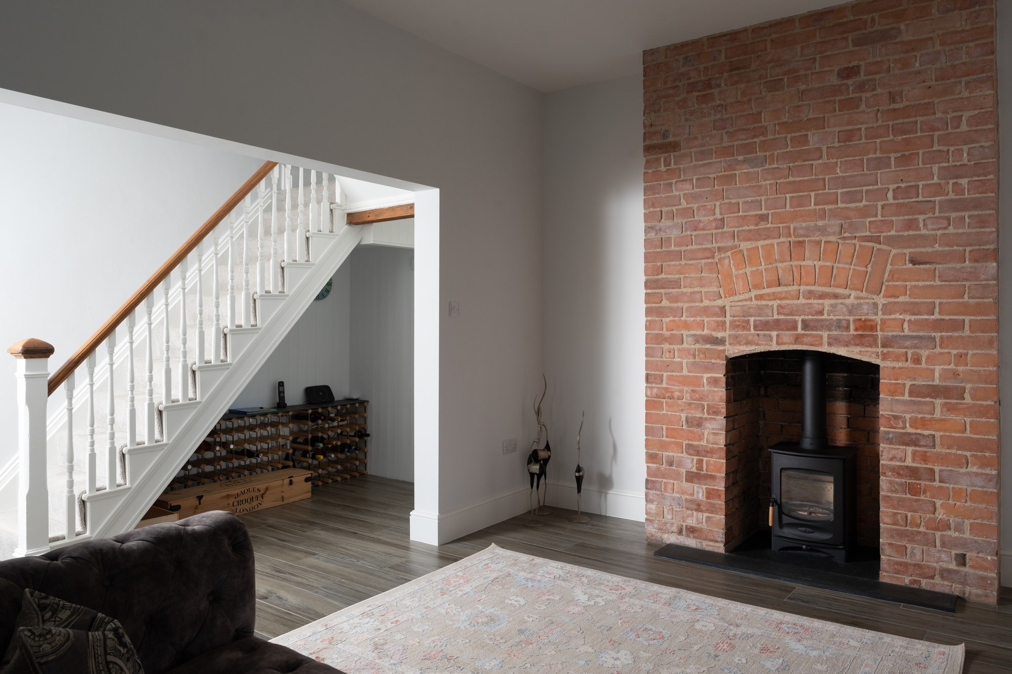 Fireplace and stairs at Kingsley House