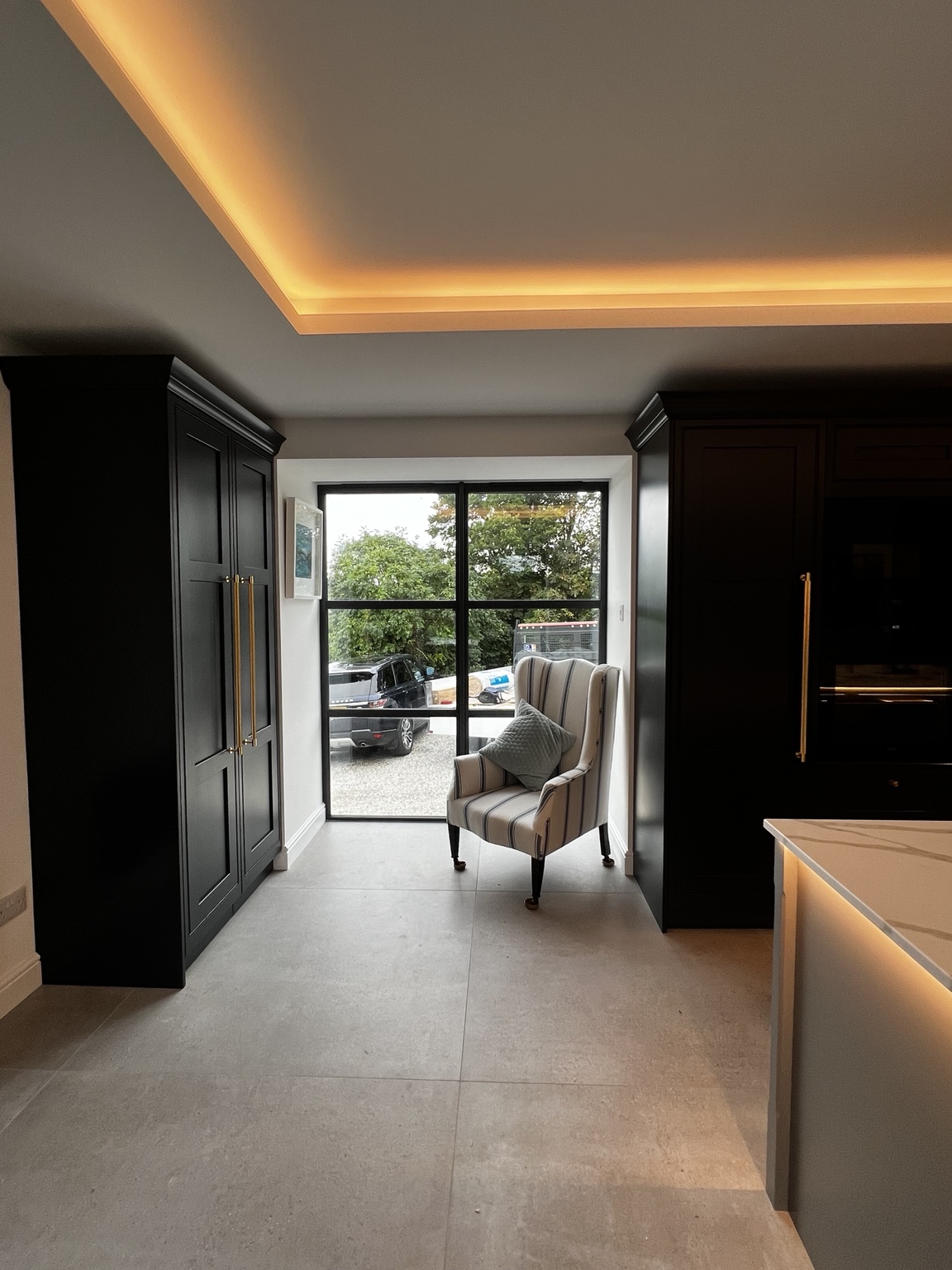 St Issy Barn Conversion kitchen with steel-framed window