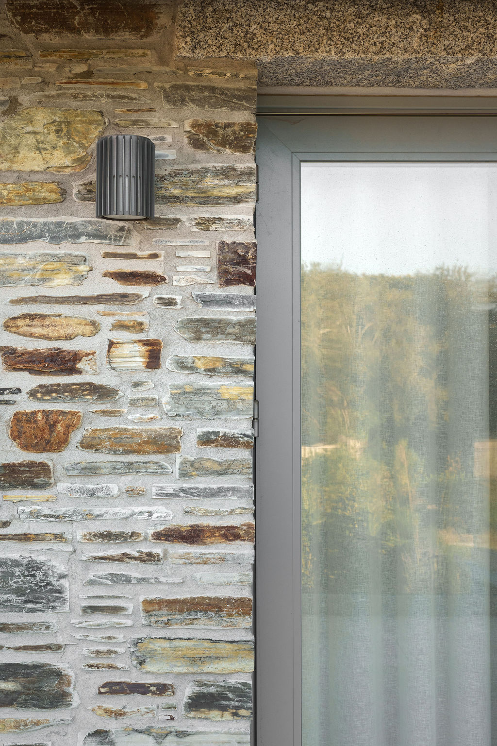 Detailed Cornish stonework beside a finished external door